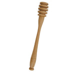 French Woodware honey dipper in beechwood with a ridged head