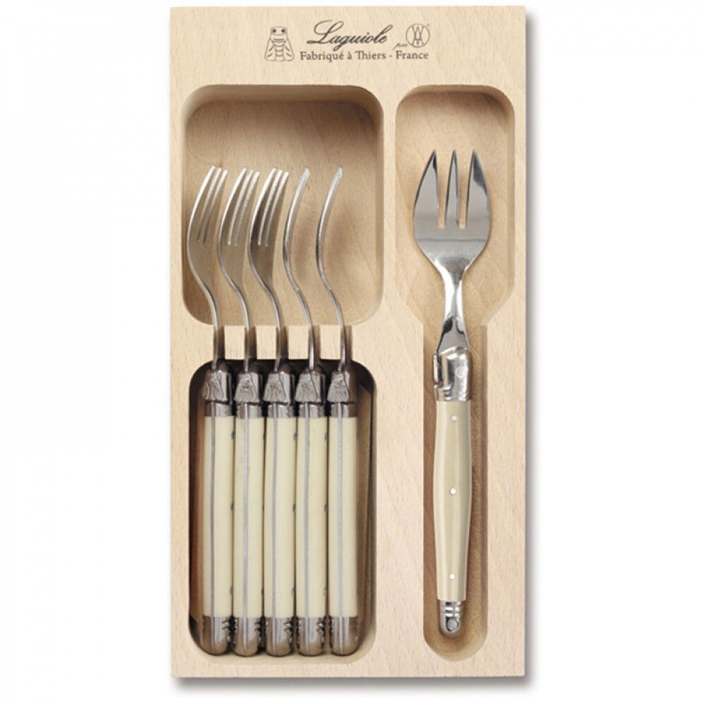 Andre Verdier Laguiole six cake forks and a serving fork with ivory coloured handles, in a wooden tray