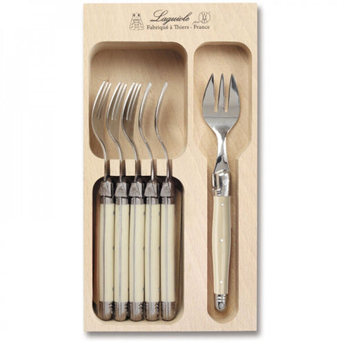 Andre Verdier Laguiole six cake forks and a serving fork with ivory coloured handles, in a wooden tray