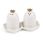 Ceramic beehive salt and pepper shakers in white with gold bee tops, on a matching tray