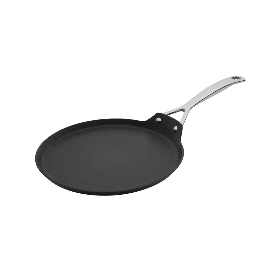 Le Creuset TNS crepe pan, 24cm, in black non-stick with a stainless steel handle