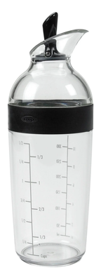 OXO Good Grips dressing shaker, a clear bottle with measurement markings and a black flip spout
