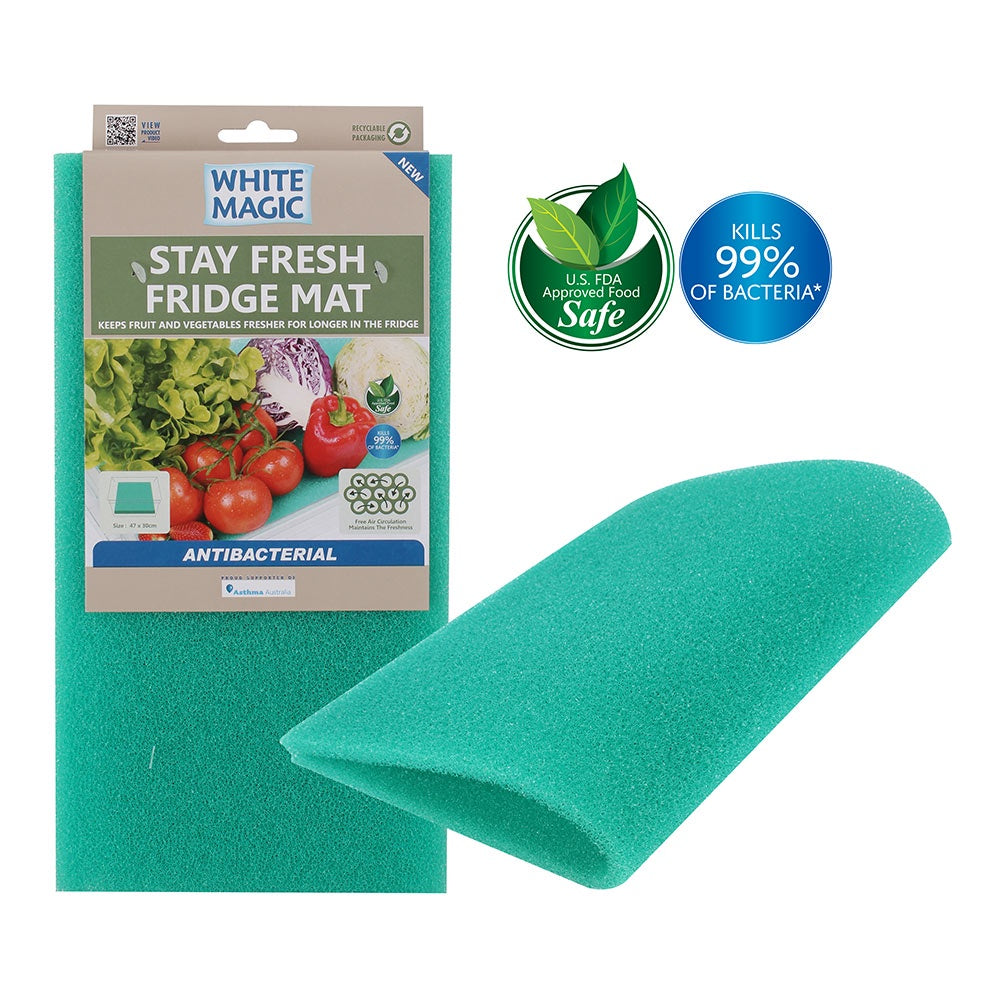 White Magic Stay Fresh Mat, a green sponge-like fridge mat, shown with its retail packaging