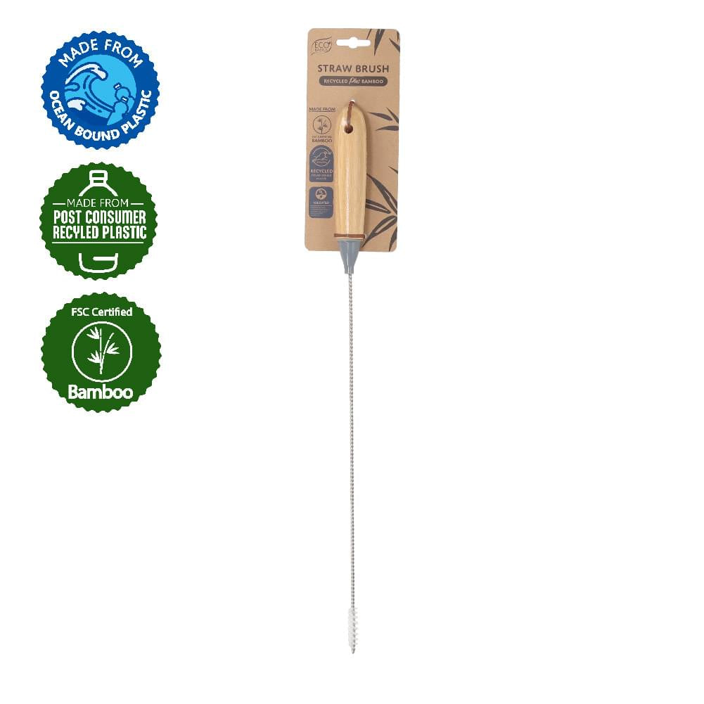 Eco Basics straw brush with a long thin wire bristle head and a bamboo handle, on its card