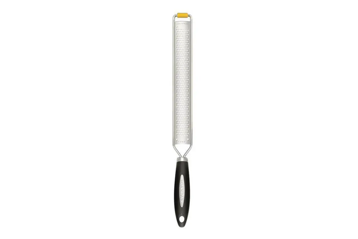 Scanpan fine rasp zester in yellow with a stainless steel grater plate and a black handle