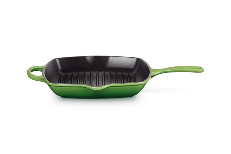 Le Creuset Signature square grill pan in green enamelled cast iron with a ridged black cooking surface