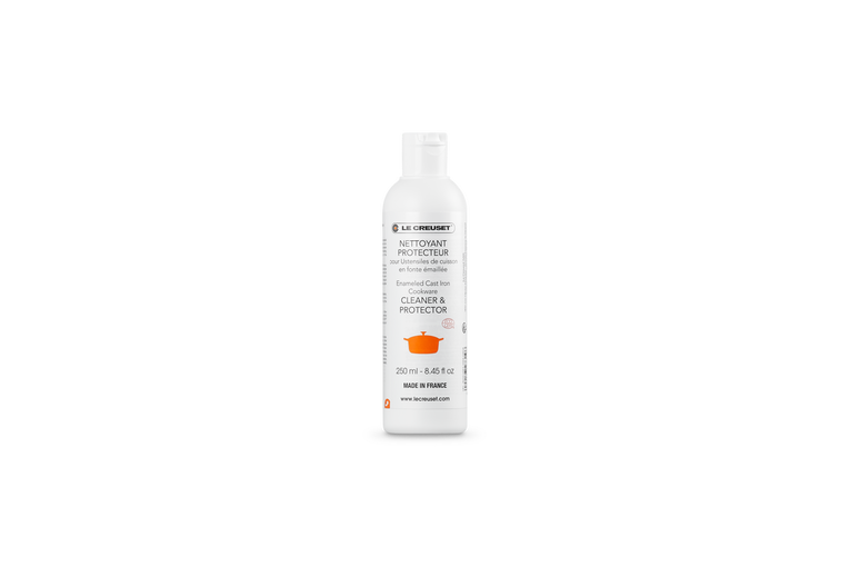 Le Creuset cookware cleaner and protector, a 250ml white bottle with an orange casserole on the label