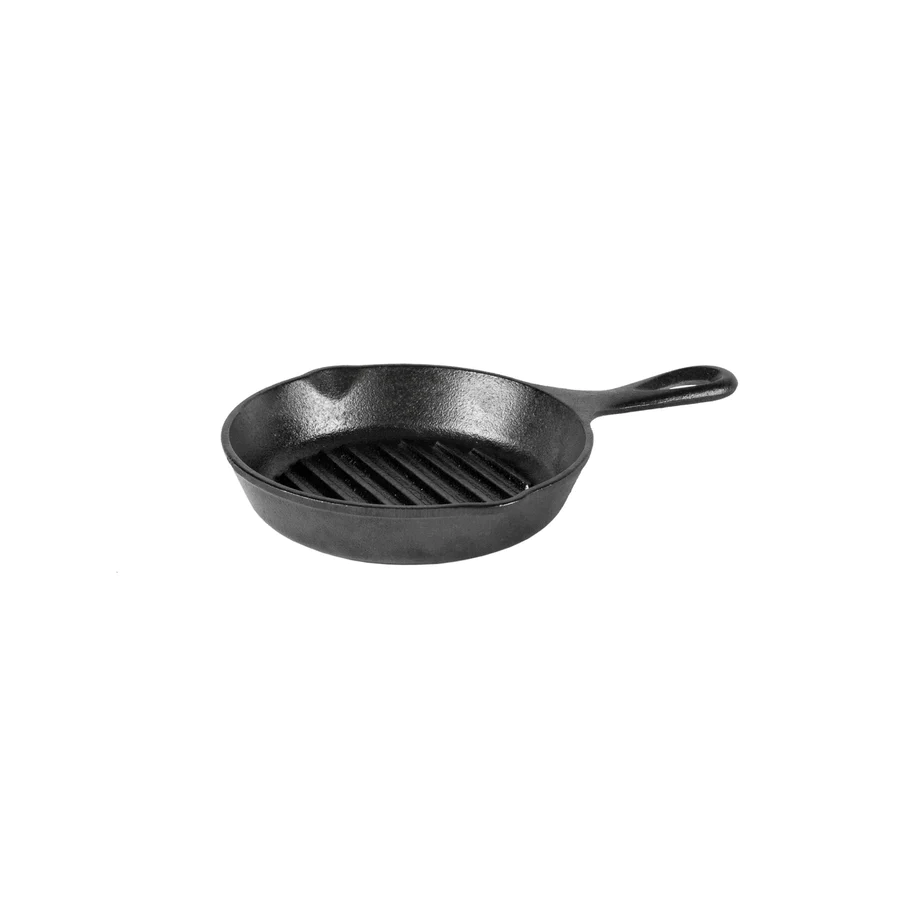 Lodge mini round grill pan in black cast iron with a handle