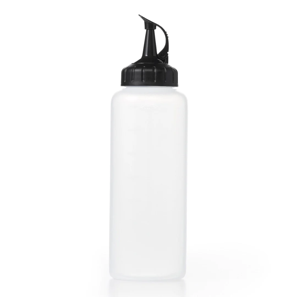 OXO Good Grips medium chef's squeeze bottle, a clear bottle with a black spout cap