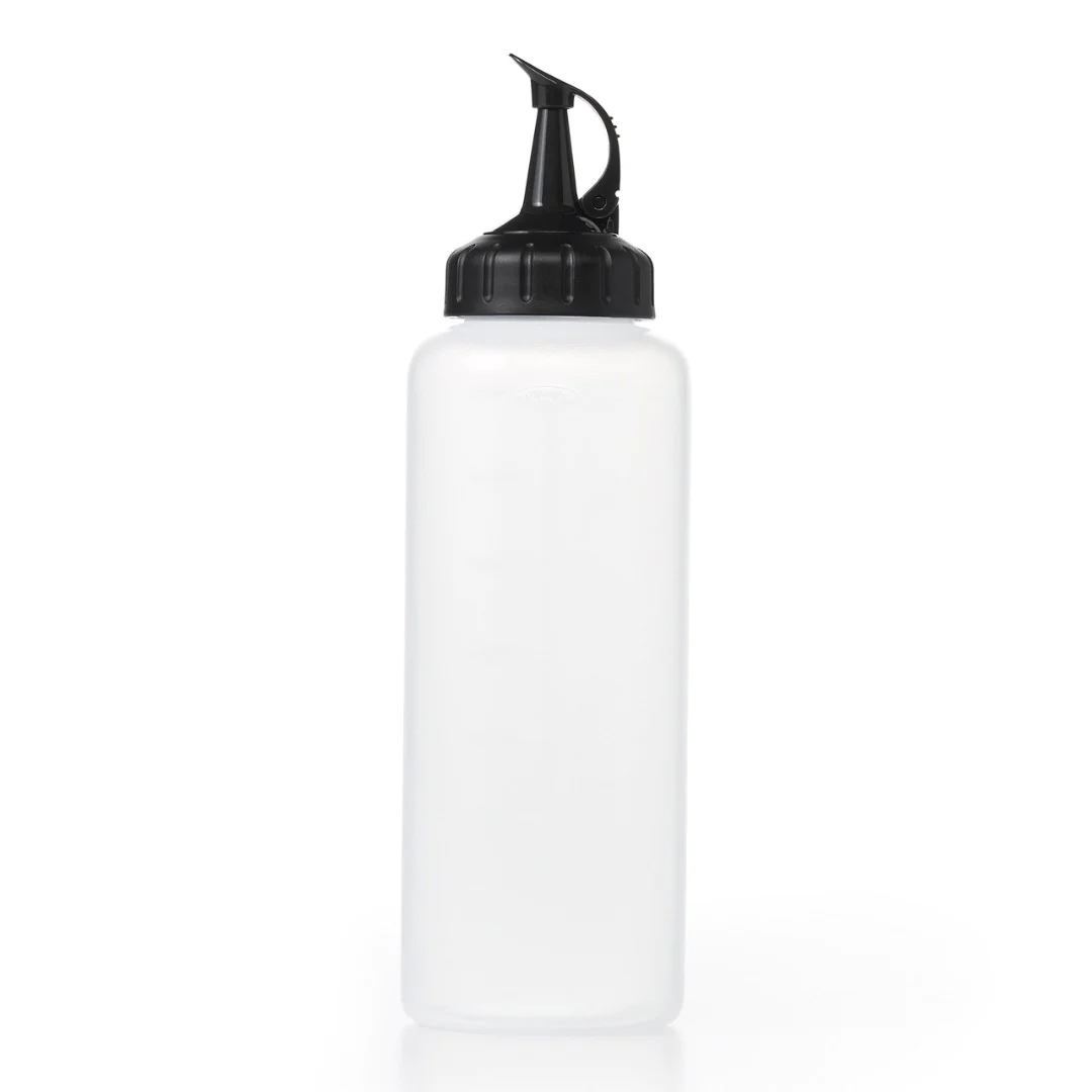 OXO Good Grips medium chef's squeeze bottle, a clear bottle with a black spout cap