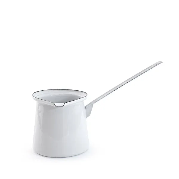 Dishy enamelware butter melter in white with a long handle and a pouring spout