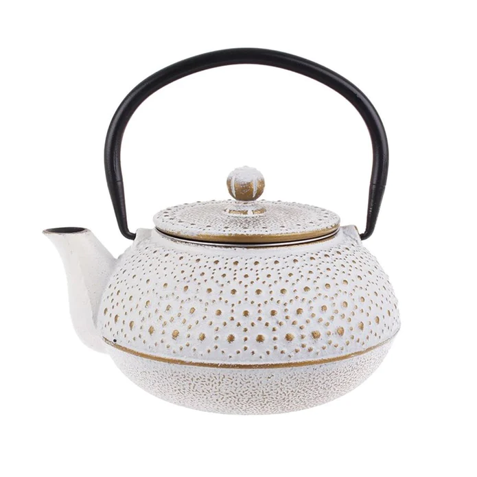 Teaology cast iron beaded teapot in white with gold detailing and a black arched handle