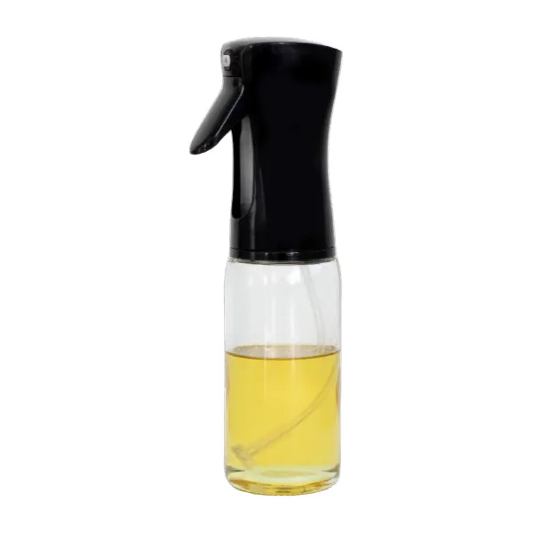 Hunt & Gather oil sprayer, a glass bottle with a black mist trigger top, filled with golden oil