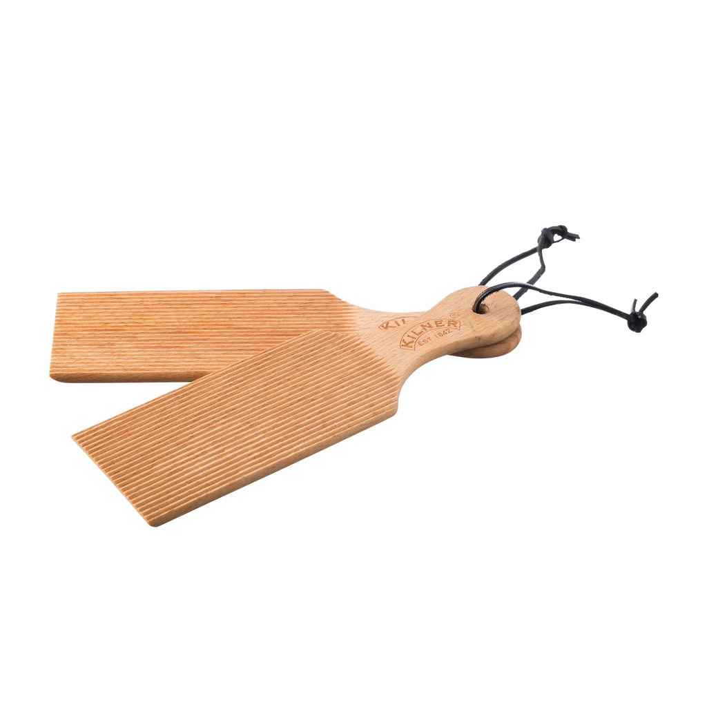 Kilner butter paddles, two ridged wooden paddles joined by a cord