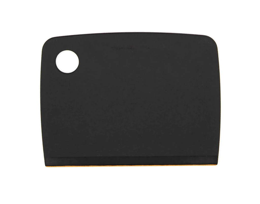 Epicurean bench scraper in black with a round hole and a flat edge