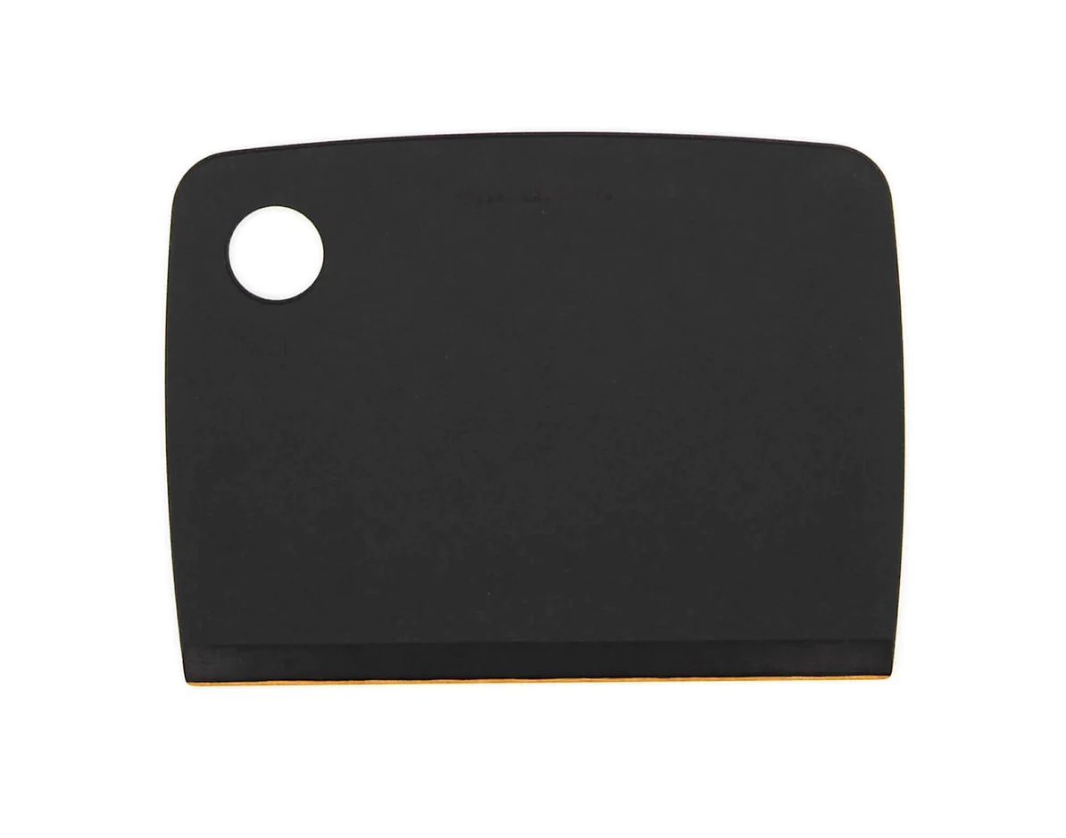 Epicurean bench scraper in black with a round hole and a flat edge