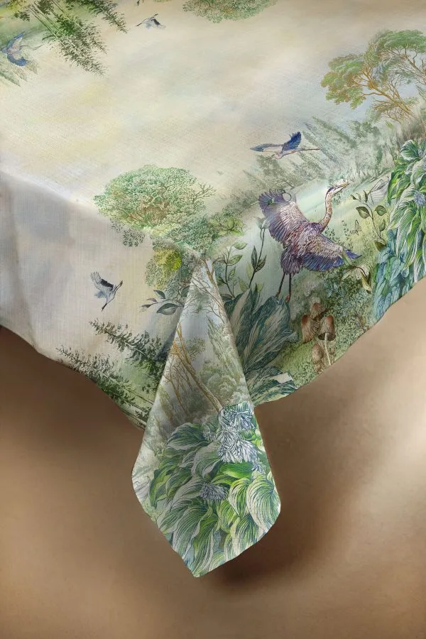 Telene Aironi Herons linen tablecloth with a painted scene of herons and foliage