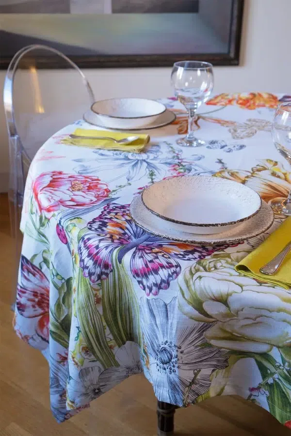 Telene Nencioni Casa Tulipani linen tablecloth with a tulip print, styled on a dining table