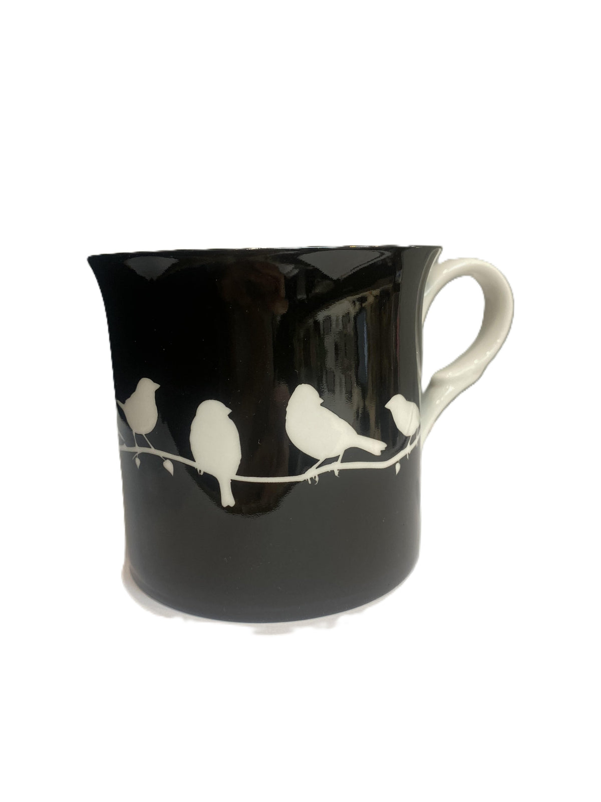 Heritage Bird Silhouette mug with white birds on a black background