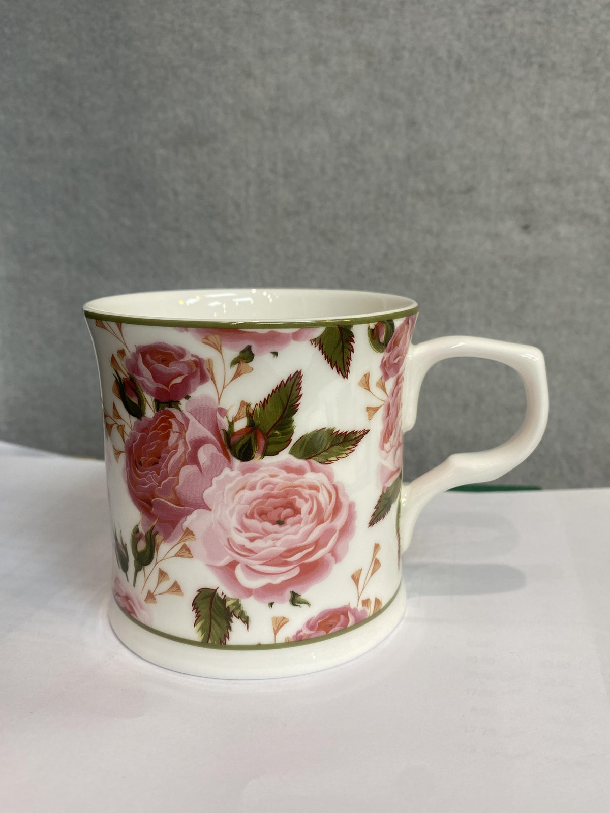 Heritage Palace mug with a Dorset pink rose floral pattern on cream