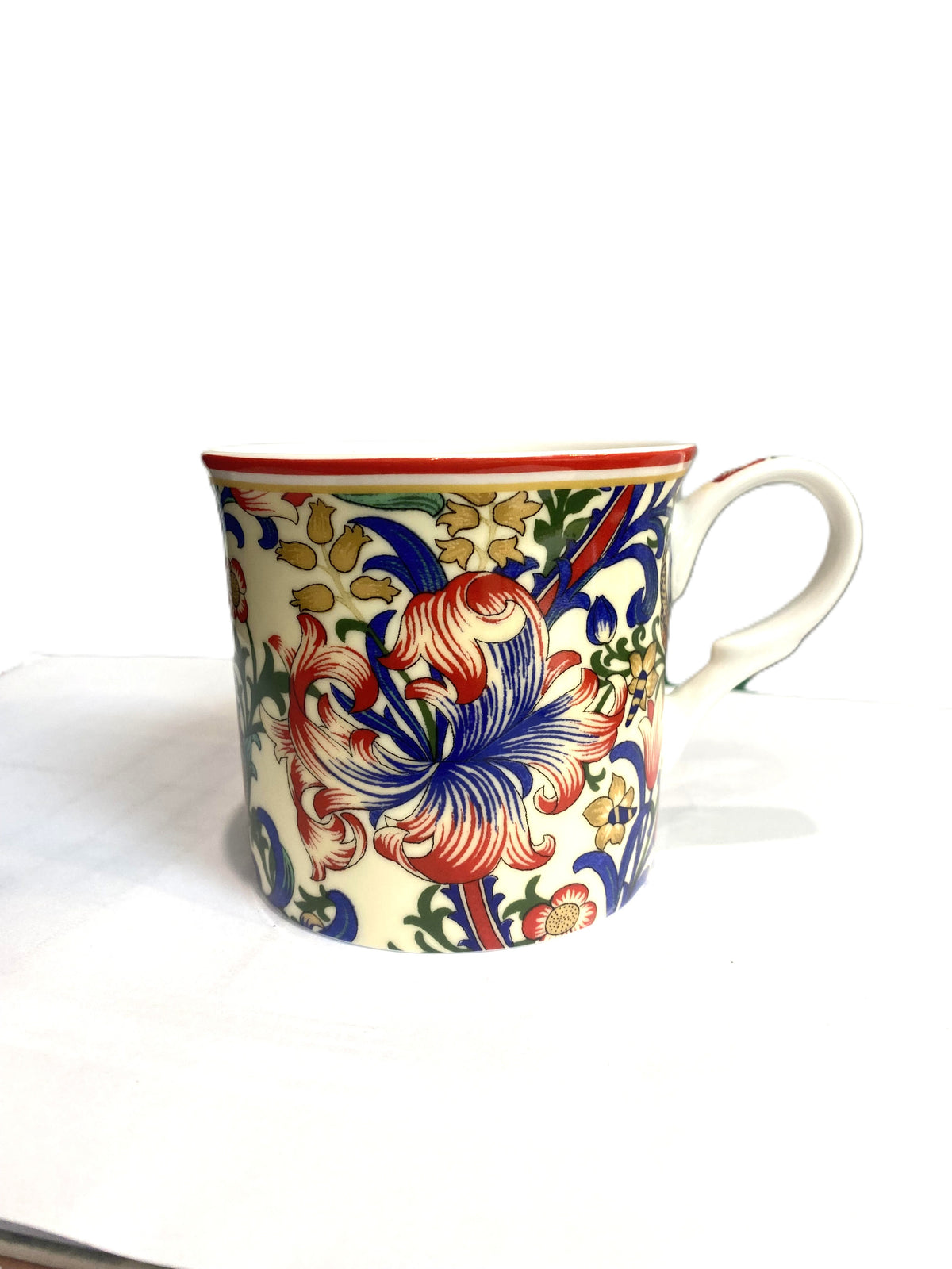 Heritage Palace mug with a William Morris Lily pattern in blue, red and cream