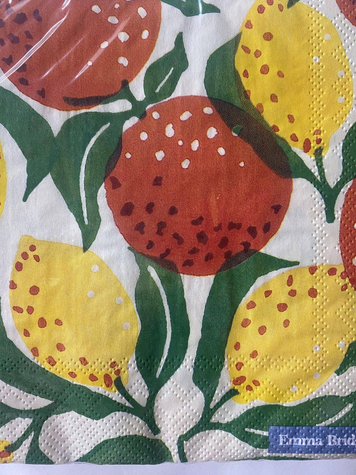 IHR Oranges and Lemons Emma Bridgewater cocktail napkin with an illustrated citrus pattern