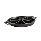 Lodge wedge pan in black cast iron with eight triangular sections and handles