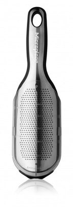 Microplane Elite Series fine grater in black with a curved handle